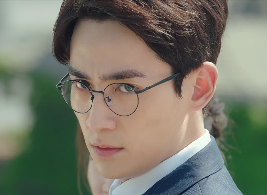 A man/Shen Wei looks to the side.