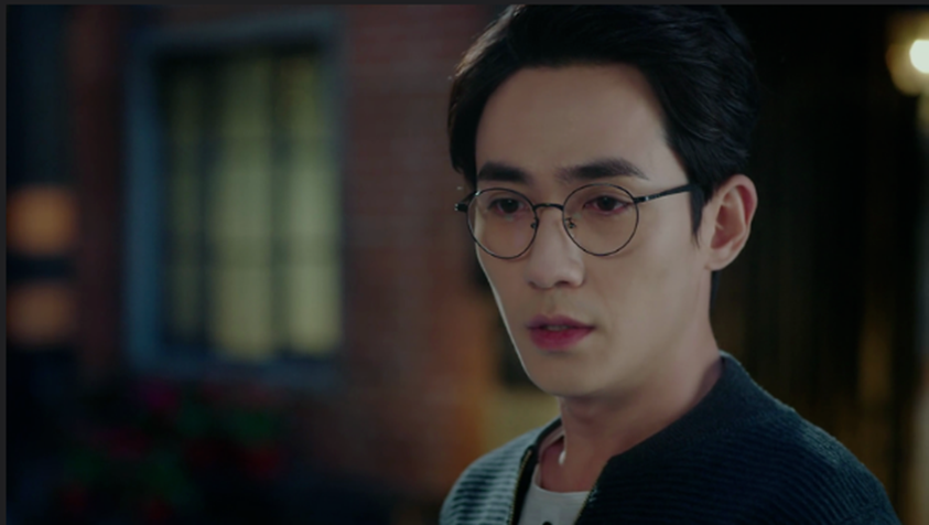 Profile view of Shen Wei as he speaks.